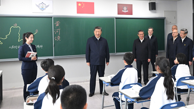 习近平：一体推进教育科技人才发展